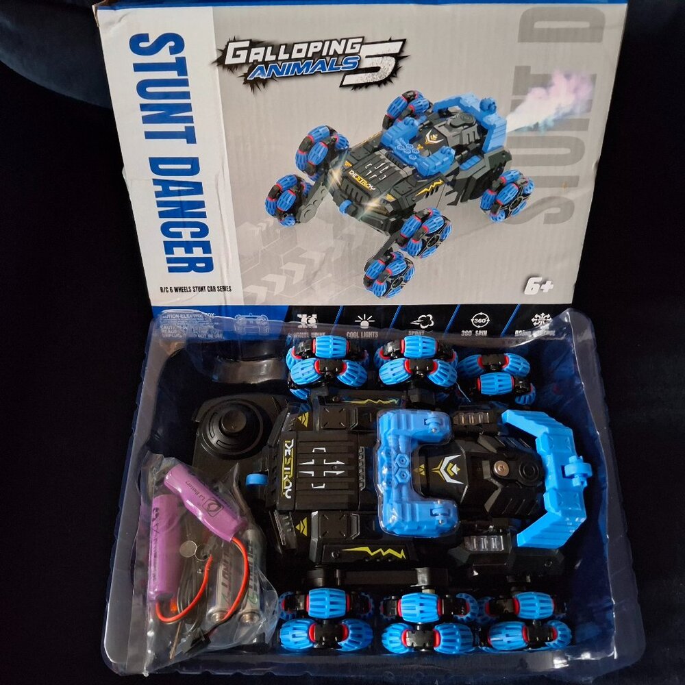 NEW 6WD Spray Swing Arm Remote Control Stunt Car Toy With Light 360 Rotation